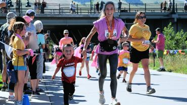 https://www.distinctlymontana.com/sites/default/files/2025-06/kids_run_-_trasie_humble.jpg